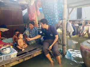 Friends Social Worker visiting flood affected family